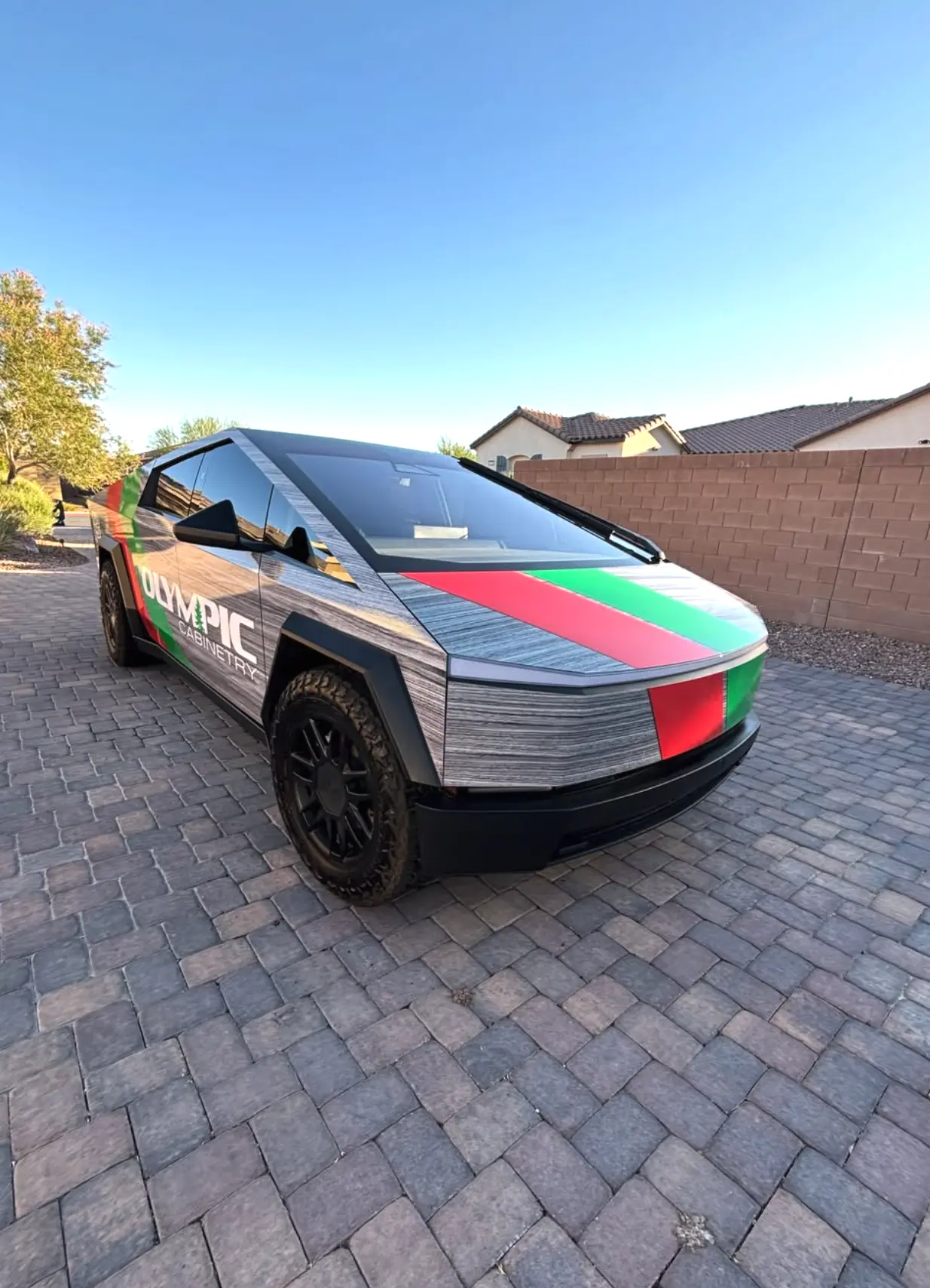 Custom wrapped truck detailed and gleaming in a driveway